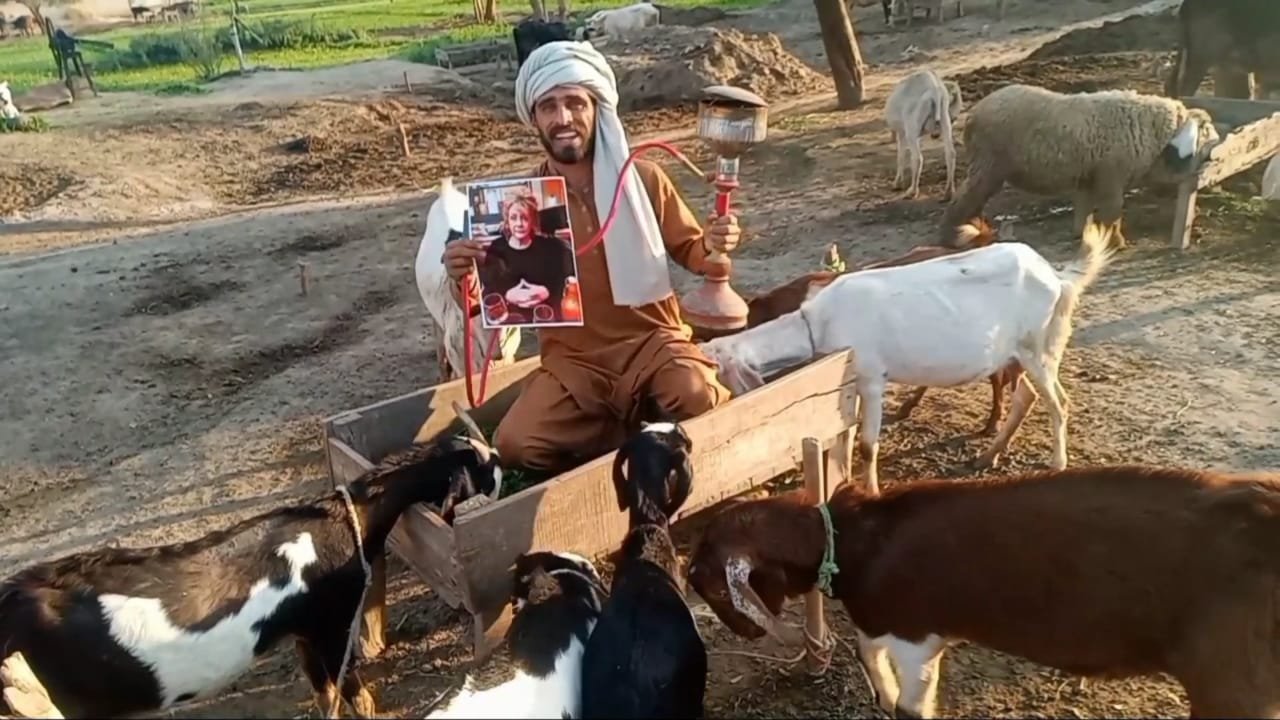 Personalized birthday video for dad filmed by real villagers with his photo